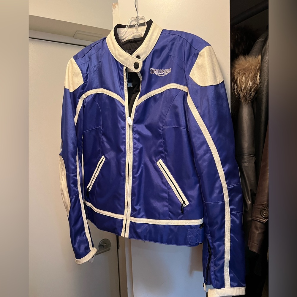 Triumph motorcycle jacket, leather and nylon. Fun jacket!